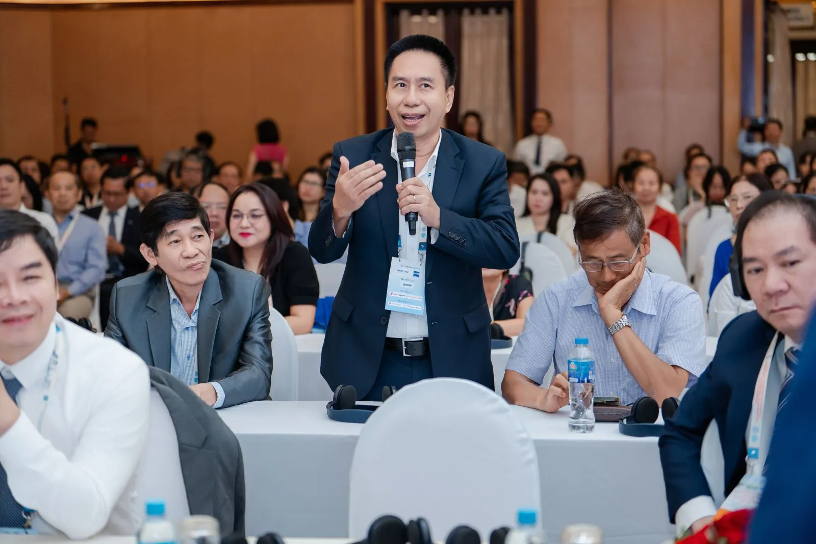 A delegate sharing views during a discussion